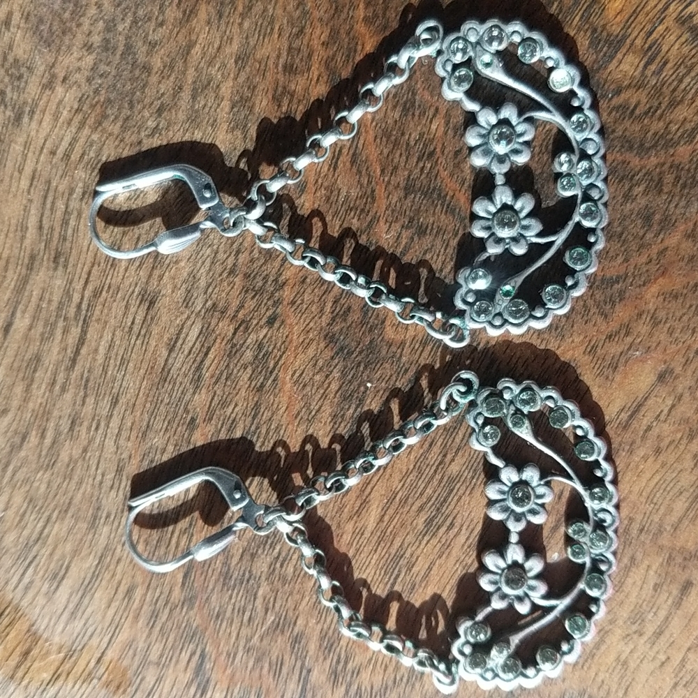 La vie daisy flower dangle earrings. Missing three tiny stones on one earring.